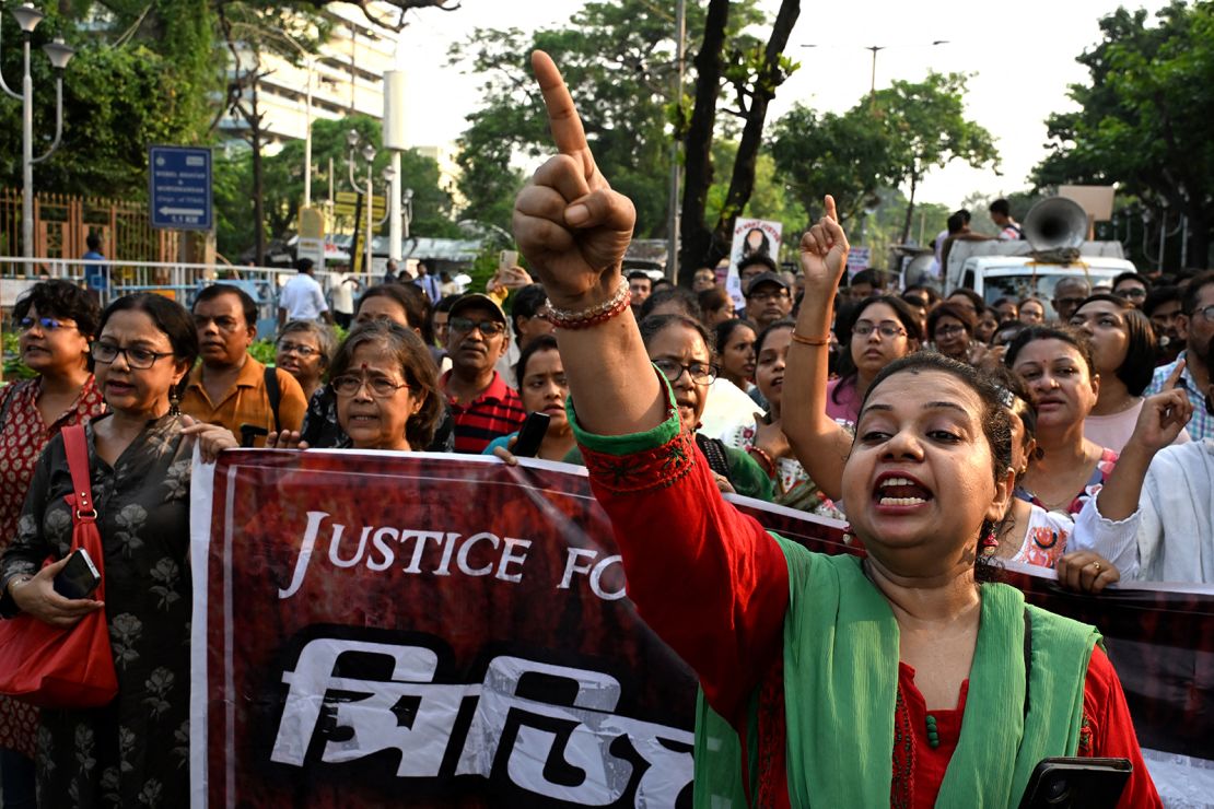 Activists and medical professionals shout slogans as they take part in a protest march to condemn the rape and murder of a doctor in Kolkata on September 20, 2024.